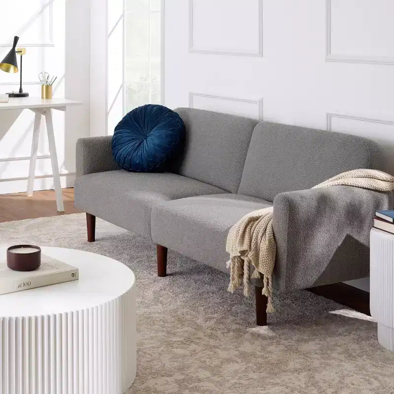 Divano letto futon convertibile curvo, in tessuto bouclé, con schienale sdoppiato