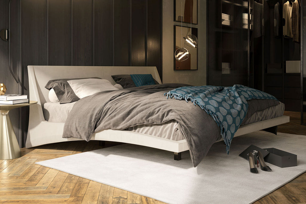 Letto in pelle Dylan - La sua struttura rigorosamente geometrica e il sistema di supporto nascosto creano l'illusione di un letto fluttuante, rendendo Dylan un'audace