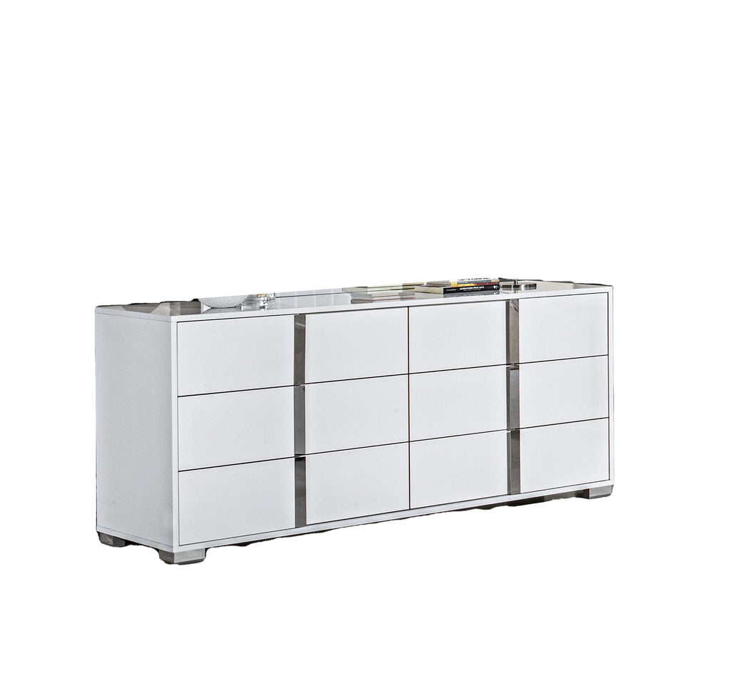 Comò Alice e Specchio in Bianco Lucido - Colore: Bianco Materiale: Impiallacciatura in legno Stile: Moderno Dimensioni: Comò: 65,3L x 18,9P x 34,2A Specchio: 39,3L x